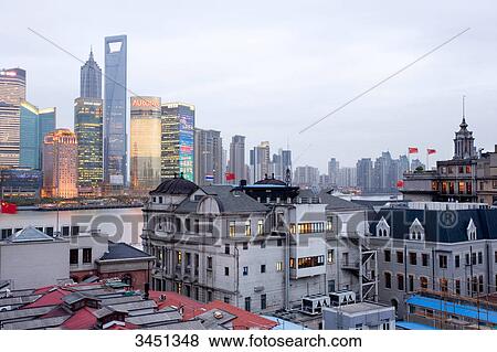 Stock Photo - Jin-Mao-Tower, Shanghai World Financial Center and Huangpu River in the evening, China, elevated view . Fotosearch