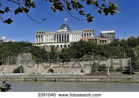 Stock Image - Kura River and presidential palace, Tbilisi, Georgia . Fotosearch
