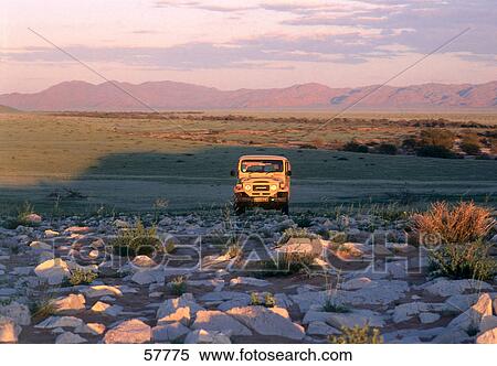 Stock Photography - Land cruiser on landscape, Namibia . Fotosearch