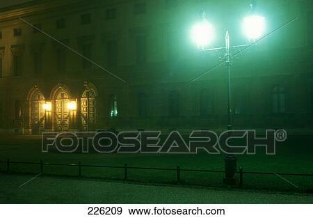 Stock Photo - Lantern lit up at garden, Hofgarten, Munich, Bavaria, Germany . Fotosearch