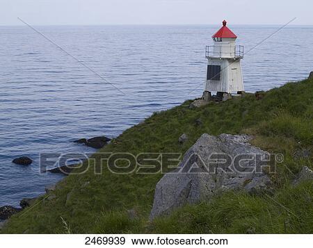 Stock Photo - Lighthouse on coast, Eggum, Lofoten, Nordland County, Norway . Fotosearch