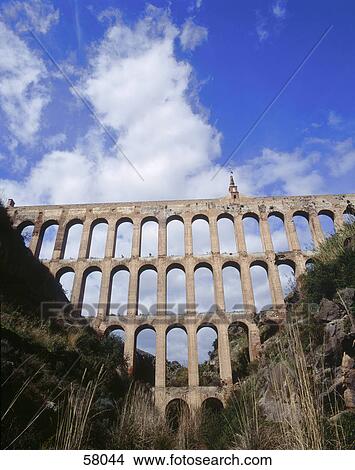 Picture - Low angle view of aqueduct, Nerja, Spain . Fotosearch