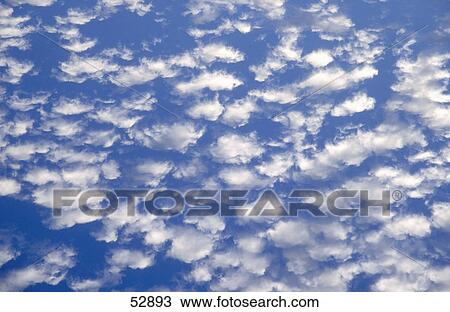 Low angle view of clouds in sky View Large Photo Image Stock Image - Low angle view of clouds in sky . Fotosearch