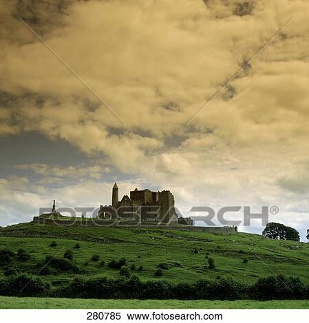 Low angle view of palace on hill under cloudy sky, Rock Of Cashel, Republic of Ireland View Large Photo Image Stock Photography - Low angle view of palace on hill under cloudy sky, Rock Of Cashel, Republic of Ireland . Fotosearch