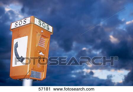 Stock Image - Low angle view of pay phone . Fotosearch