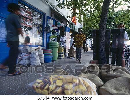 Men at street market, Maldives View Large Photo Image Picture - Men at street market, Maldives . Fotosearch