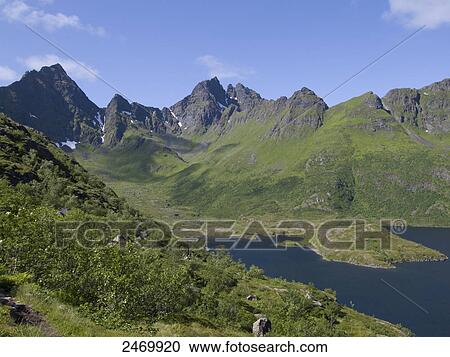 Stock Image - Mountains at seaside, Moskenesoya, Lofoten, Nordland County, Norway . Fotosearch