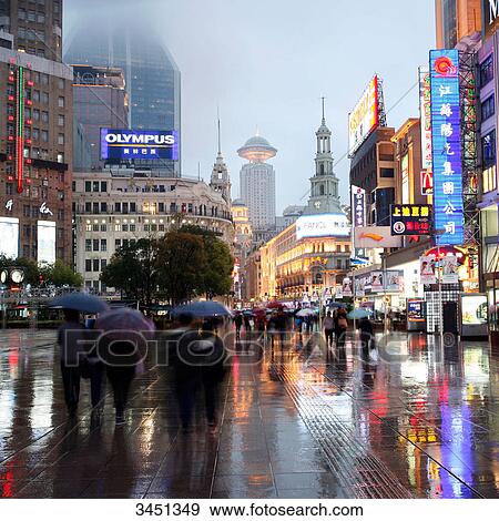Stock Photo - Nanjing Road in the evening, Puxi, Shanghai, China . Fotosearch