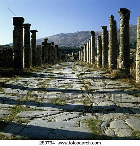 Picture - Old ruins of buildings on landscape, Algeria . Fotosearch
