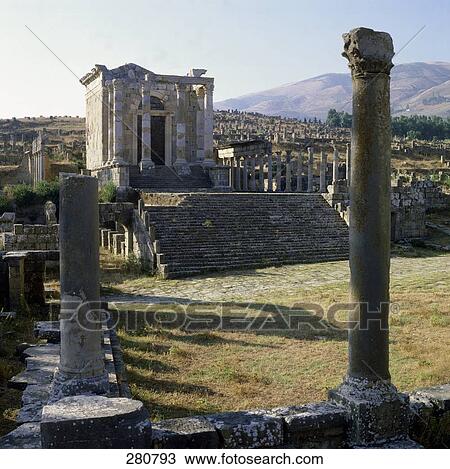 Stock Image - Old ruins of buildings on landscape, Algeria . Fotosearch
