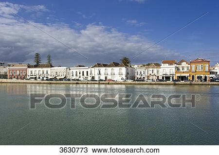 Stock Image - Old tow with Rio Gilao, Tavira, Algarve, Portugal . Fotosearch