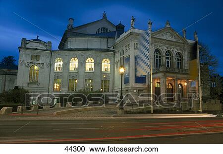 Stock Image - Opera house lit up at night, Prince Regent Theatre, Munich, Bavaria, Germany . Fotosearch