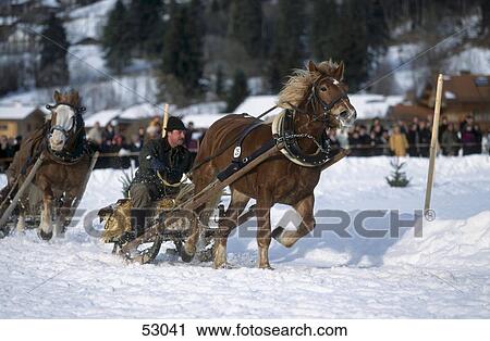 Stock Image - Participants in horse race festival, Rottach-Egern, Bavaria, Germany . Fotosearch