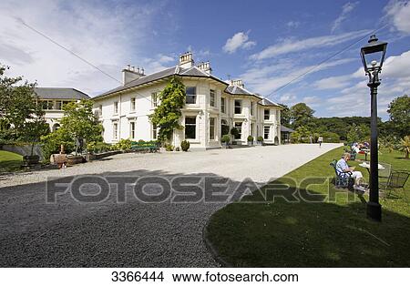 Picture - People in a park beside the Rathmullan House hotel, Rathmullan, Ireland . Fotosearch