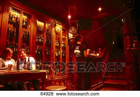 Stock Photo - People in pub, Porter House, Parliament Street, Dublin, Republic Of Ireland . Fotosearch