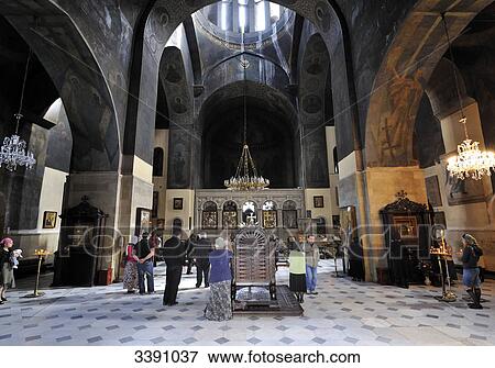 Stock Photo - People in Sioni Cathedral, Tbilisi, Georgia . Fotosearch