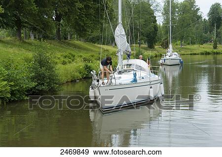 People on boat in canal, Gota Canal, Tatorp, Sweden View Large Photo Image Stock Photo - People on boat in canal, Gota Canal, Tatorp, Sweden . Fotosearch