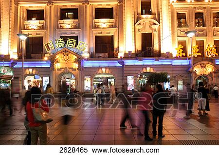 People on road at night, Buildings lit up at night, Nanjing Road, Shanghai, China View Large Photo Image Stock Photography - People on road at night, Buildings lit up at night, Nanjing Road, Shanghai, China . Fotosearch