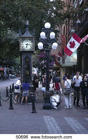 Stock Photograph - People walking in street, Vancouver, British Columbia, Canada . Fotosearch