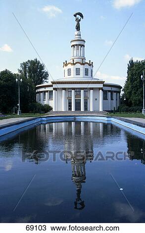 Pond in front of building under clear blue sky, Kiev, Ukraine View Large Photo Image Stock Image - Pond in front of building under clear blue sky, Kiev, Ukraine . Fotosearch