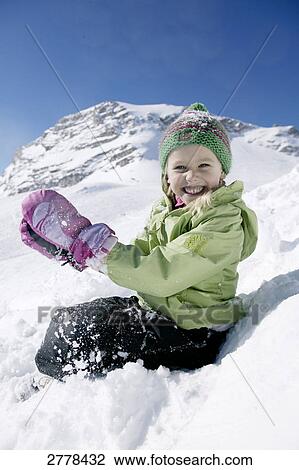 Portrait of girl smiling on snowcovered landscape View Large Photo Image Stock Image - Portrait of girl smiling on snowcovered landscape . Fotosearch