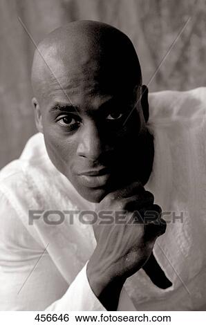 Portrait of mid adult man thinking View Large Photo Image Stock Photograph - Portrait of mid adult man thinking . Fotosearch