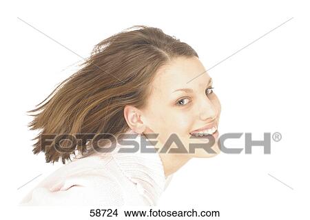 Picture - Portrait of young woman smiling . Fotosearch