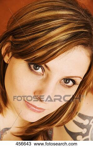 Portrait of young woman smiling View Large Photo Image Stock Image - Portrait of young woman smiling . Fotosearch