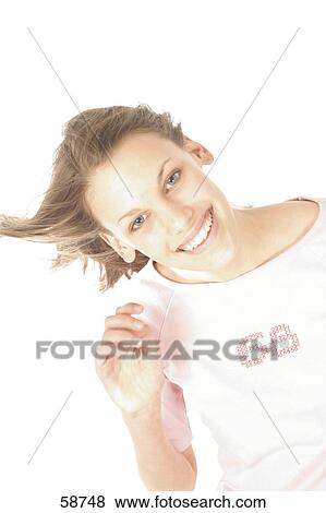 Stock Photo - Portrait of young woman smiling . Fotosearch