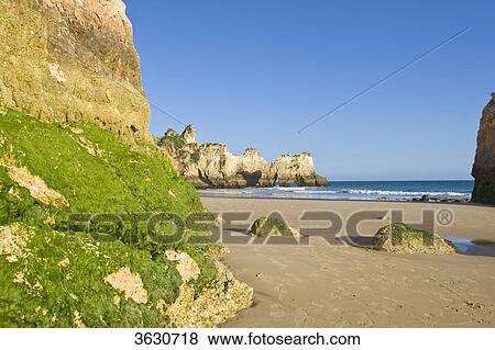 Stock Photo - Praia dos Tres Irmaos, Alvor, Algarve, Portugal . Fotosearch