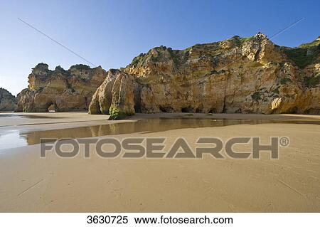 Stock Photography - Praia dos Tres Irmaos, Alvor, Algarve, Portugal . Fotosearch