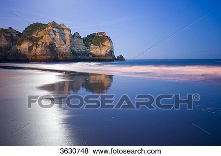Stock Photo - Praia dos Tres Irmaos at night, Alvor, Algarve, Portugal . Fotosearch