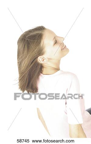 Stock Photography - Rear view of young woman smiling . Fotosearch