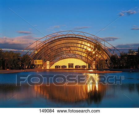 Picture - Reflection of building in pond, Leipzig, Saxony, Germany . Fotosearch