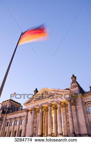 Picture - Reichstag and german flag, Berlin, Germany . Fotosearch