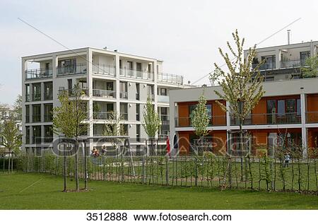 Stock Photo - Residential neighborhood with playground in Munich, Germany . Fotosearch