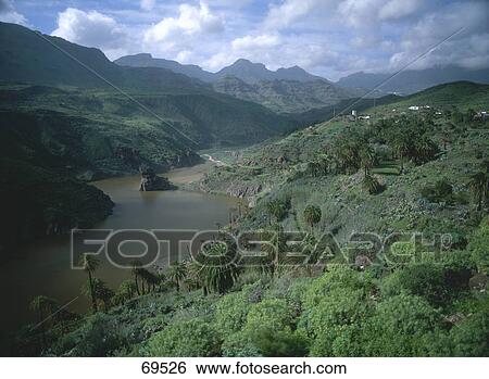 River flowing through mountains, Gran Canaria, Canary Islands, Spain View Large Photo Image Stock Photograph - River flowing through mountains, Gran Canaria, Canary Islands, Spain . Fotosearch