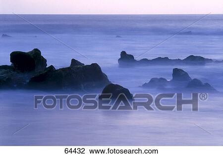 Stock Image - Rock formation in sea, Tenerife, Spain . Fotosearch