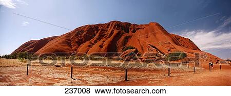 Stock Photo - Rock formation on landscape, Ayers Rock, Northern Territory, Australia . Fotosearch