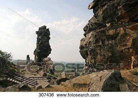 Stock Photograph - Rock formations on landscape, Devils Wall, Harz, Saxony-Anhalt, Germany . Fotosearch