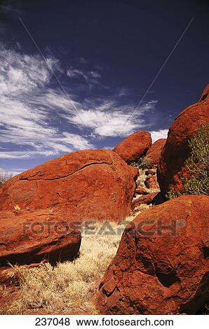 Rock formations on landscape, Uluru-Kata Tjuta National Park, Northern Territory, Australia View Large Photo Image Stock Photo - Rock formations on landscape, Uluru-Kata Tjuta National Park, Northern Territory, Australia . Fotosearch