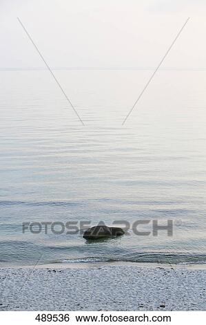 Stock Photograph - Rock on beach, Bornholm Island, Denmark . Fotosearch