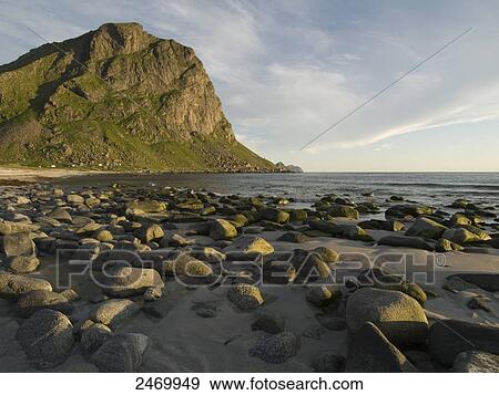 Stock Photo - Rocks on beach, Utakleiv, Lofoten, Nordland County, Norway . Fotosearch