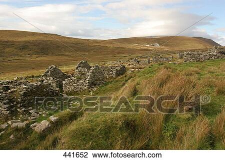 Stock Image - Ruins on rural landscape, Achill Island, County Mayo, Republic of Ireland . Fotosearch
