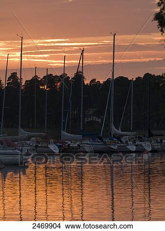 Sailboats docked at harbor, Goeta Canal, Karlsborg, Vastergotland, Vastra Gotaland County, Sweden View Large Photo Image Picture - Sailboats docked at harbor, Goeta Canal, Karlsborg, Vastergotland, Vastra Gotaland County, Sweden . Fotosearch
