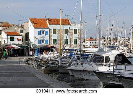 Stock Image - Sailing boats at the marina of Vodice, Croatia . Fotosearch