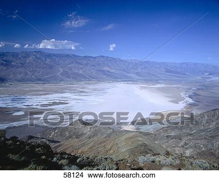 Picture - Salt lake near a mountain, Badwater, Death Valley National Park, Death Valley, California, USA . Fotosearch