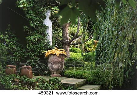 Sculpture and potted plants in garden, Germany View Large Photo Image Stock Image - Sculpture and potted plants in garden, Germany . Fotosearch