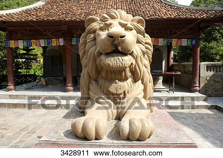 Stock Image - Sculpture of a lion in a temple, Perfume Pagoda (Chua Huong), Vietnam . Fotosearch