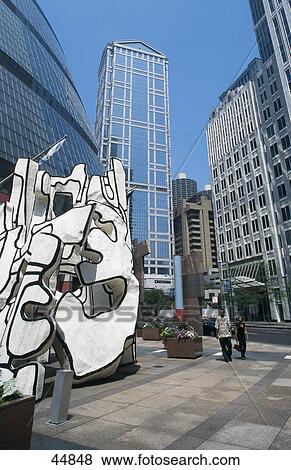 Sculpture with buildings in background, R. R. Donnelley Center, James R. Thompson Center, Chicago, Cook County, Illinois, USA View Large Photo Image Stock Photo - Sculpture with buildings in background, R. R. Donnelley Center, James R. Thompson Center, Chicago, Cook County, Illinois, USA . Fotosearch